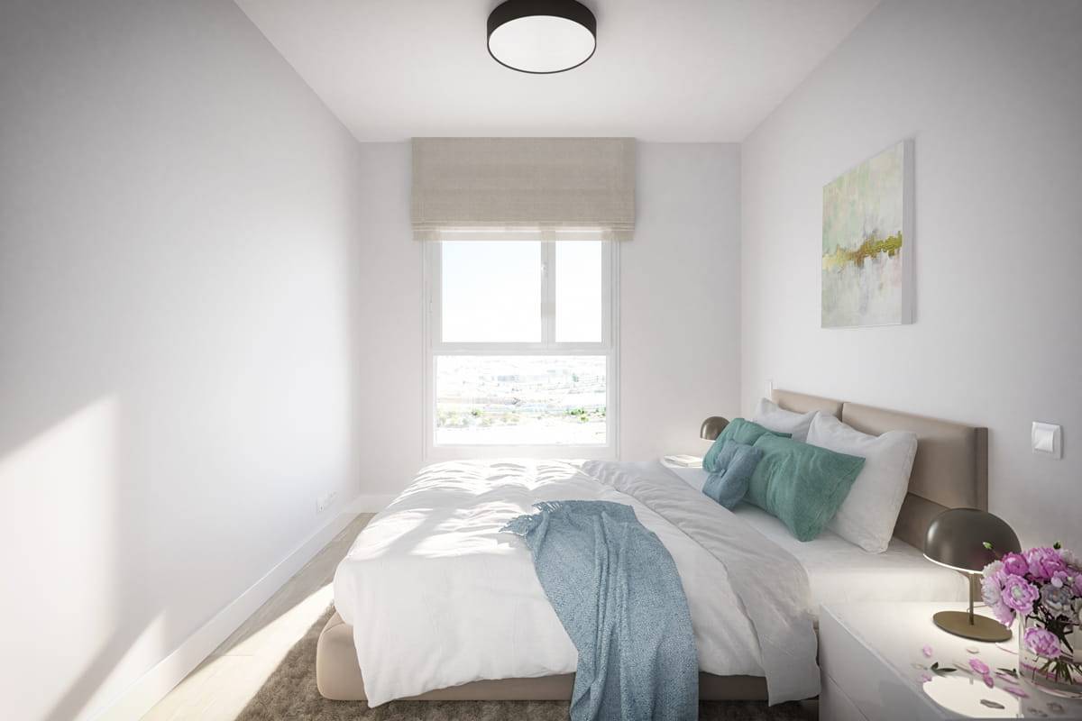 Dormitorio principal con mucha luz de nuestros pisos nuevos en Sant Joan Despí